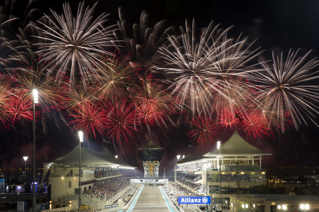 A photograph of the sky filled with colourful fireworks at the end of race day with the finish line and Shams Tower in the distance. Formula 1 Etihad Airways Abu Dhabi Grand Prix. Yas Marina Circuit, 29th November 2015. United Arab Emirates.