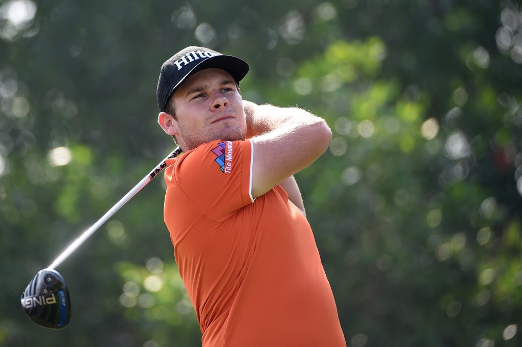 ABU DHABI, UNITED ARAB EMIRATES - JANUARY 23: Tyrrell Hatton of England hits his tee shot on the fifth hole during the third round of the Abu Dhabi HSBC Golf Championship at the Abu Dhabi Golf Club on January 23, 2016 in Abu Dhabi, United Arab Emirates.  (Photo by Ross Kinnaird/Getty Images)
