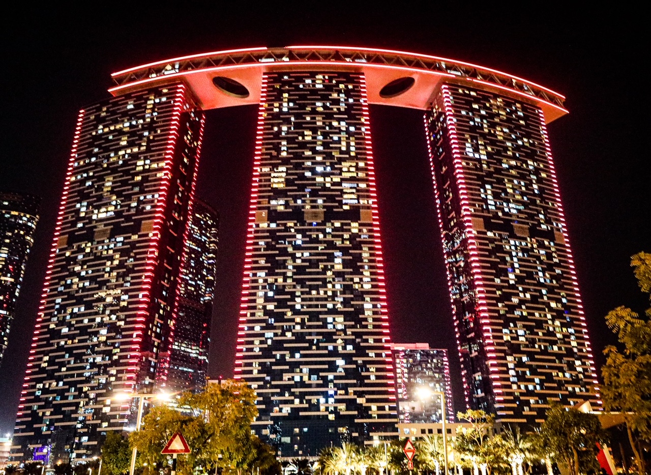 Abu Dhabi’s Iconic Gate Towers In Al Reem Island Light Up In Red To Celebrate The Entry Of The Hope Probe To The Mars Orbit